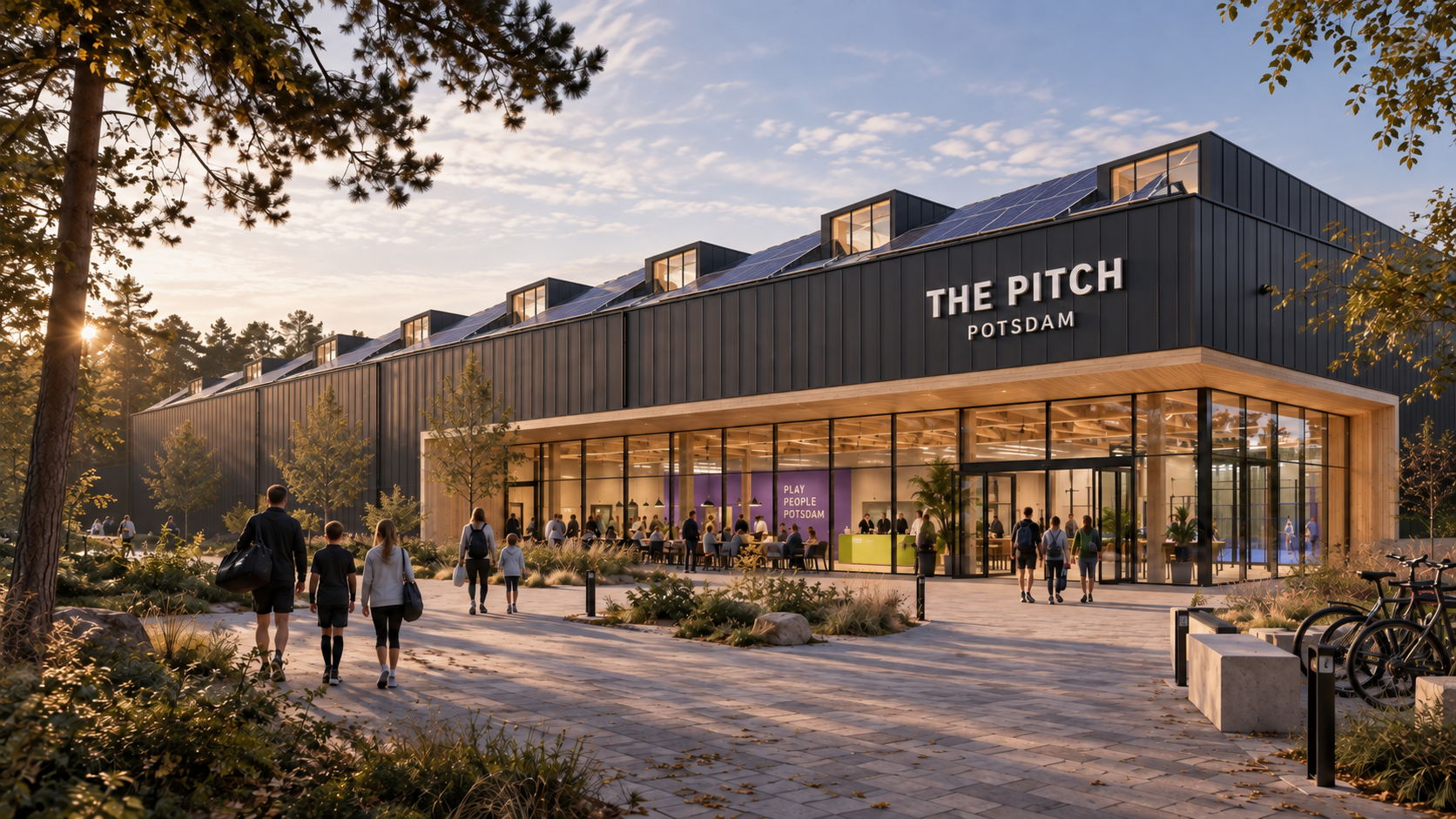 The Pitch Potsdam: eigene Außenansicht mit dunkler Hülle und offenem Foyer